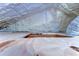 View of the attic showing spray foam insulation at 829 E Lime St, Lakeland, FL 33801