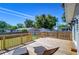 Spacious wooden deck perfect for outdoor entertaining, with lawn chairs at 829 E Lime St, Lakeland, FL 33801