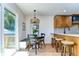 Breakfast nook features wood-like floors and sliding doors to the exterior at 829 E Lime St, Lakeland, FL 33801
