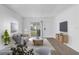 Bright living room featuring modern furnishings, sleek decor, and ample natural light at 4215 S Semoran Blvd # 3, Orlando, FL 32822