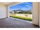 Outdoor patio with brick pavers leading to fenced backyard, and view of neighboring houses at 3158 Sailing Pier Ave, Winter Garden, FL 34787