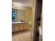 Bathroom featuring a wooden vanity with sink and medicine cabinet at 3337 Soho St # 103, Orlando, FL 32835
