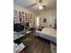 Bright bedroom with a neutral color scheme, modern desk, and ample closet space at 3324 Parkchester Square Blvd # 102, Orlando, FL 32835