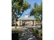 Community entrance with clock tower provides a safe and welcoming entryway at 3301 Soho St # 102, Orlando, FL 32835