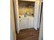 A laundry closet with a side by side washer and dryer set at 3337 Soho St # 103, Orlando, FL 32835