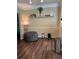 A cozy space featuring wood floors and decorative wall accents at 3337 Soho St # 103, Orlando, FL 32835