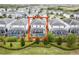 Aerial view of a single Gathering home with a screened pool and manicured backyard at 1568 Maidstone Ct, Davenport, FL 33896