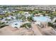 An aerial view of the community pool, splash pad, and lounge area at 1568 Maidstone Ct, Davenport, FL 33896