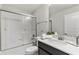 Bathroom with a tub, shower, vanity, and white tile at 1568 Maidstone Ct, Davenport, FL 33896