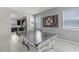 Bright game room with ping pong table and tic-tac-toe board at 1568 Maidstone Ct, Davenport, FL 33896