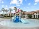 A colorful splash pad area provides a fun and safe water play area at 1568 Maidstone Ct, Davenport, FL 33896