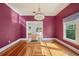Dining room with hardwood floors, a contemporary chandelier, and light wall color at 515 Frank Lloyd Wright Way, Lakeland, FL 33803