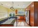 Well-equipped kitchen featuring stainless steel appliances, granite countertops, and plenty of natural light at 515 Frank Lloyd Wright Way, Lakeland, FL 33803
