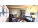 Cozy dining area filled with natural light, perfect for casual meals, featuring a grill for convenient outdoor cooking at 472 Blue Heron Cir, River Ranch, FL 33867