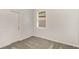 Neat bedroom with a built-in closet, plush carpet, and a window that brings in natural light at 8249 Sw 52Nd Lane Rd, Ocala, FL 34481
