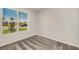 Inviting bedroom with plush carpeting and a window that offers a pleasant view of the neighborhood at 8249 Sw 52Nd Lane Rd, Ocala, FL 34481