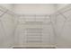 Spacious walk-in closet featuring extensive wire shelving for optimal storage and organization at 8249 Sw 52Nd Lane Rd, Ocala, FL 34481