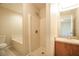 Bathroom with shower, soaking tub, and vanity with ample counter space at 143 Inconnu Ct, Kissimmee, FL 34759