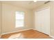 Bright bedroom features a window, closet and ceiling fan at 143 Inconnu Ct, Kissimmee, FL 34759