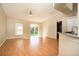 The spacious living room is filled with natural light and sliding glass doors to the backyard at 143 Inconnu Ct, Kissimmee, FL 34759
