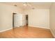 The spacious main bedroom features ceiling fan and laminate flooring at 143 Inconnu Ct, Kissimmee, FL 34759