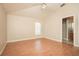 The spacious main bedroom features ceiling fan and laminate flooring at 143 Inconnu Ct, Kissimmee, FL 34759
