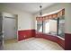 Cozy breakfast nook with large windows offering a view of the outdoor area at 2249 Cypress Cove Dr # E3, Tavares, FL 32778