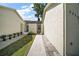 Exterior view of home and yard at 2249 Cypress Cove Dr # E3, Tavares, FL 32778
