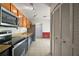 Well-lit kitchen boasting stainless steel appliances and ample cabinet space at 2249 Cypress Cove Dr # E3, Tavares, FL 32778