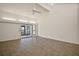 Spacious living room with high ceilings and tile flooring at 2249 Cypress Cove Dr # E3, Tavares, FL 32778