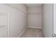Walk-in closet with carpet and shelving for optimal storage solutions at 5408 Sw 85Th Avenue Rd, Ocala, FL 34481