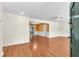 Bright living room featuring hardwood floors and fresh paint at 7013 Beverly Rd, Lakeland, FL 33813