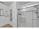 Modern bathroom with a glass-enclosed shower, sleek fixtures, and a bright, clean aesthetic at 1780 Jackson Oaks Dr, Bartow, FL 33830