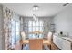 Elegant dining room features light wood floors and stylish decor at 1780 Jackson Oaks Dr, Bartow, FL 33830