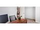 A home office with a lovely desk, chair, and adjacent closet at 5107 Bridgehaven Rd, Davenport, FL 33837