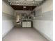 Spacious garage with white walls and gray trim features laundry area with washer and dryer at 645 W Winter Park St, Orlando, FL 32804