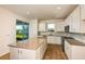 Well-lit kitchen boasts stainless steel appliances and a spacious center island at 5831 Sw 87Th Ave, Ocala, FL 34481