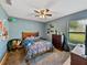 Comfortable bedroom with a bed, dresser, and carpet at 6272 Cornerstone Dr, Lakeland, FL 33813