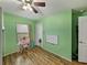 ' room features hard wood floors, a window, and a fun, playful atmosphere at 6272 Cornerstone Dr, Lakeland, FL 33813