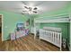 Whimsical ' bedroom with a bed and fun decor at 6272 Cornerstone Dr, Lakeland, FL 33813