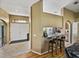 Open foyer with a breakfast bar looking into the kitchen with barstool seating at 6272 Cornerstone Dr, Lakeland, FL 33813