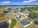 Wide aerial view of the community, lake, and other homes in the neighborhood at 917 Shawna Shrs, Haines City, FL 33844
