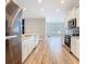 Modern kitchen with stainless steel appliances, granite countertops, and wood flooring at 917 Shawna Shrs, Haines City, FL 33844