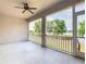 Enjoy the beautiful views in this spacious screened lanai complete with a ceiling fan at 917 Shawna Shrs, Haines City, FL 33844