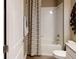 Clean and modern bathroom featuring a shower-tub combo and contemporary fixtures at 1919 Blissful Dr, Kissimmee, FL 34744