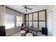 Contemporary home office featuring modern furnishings, neutral decor, and ample natural light at 1919 Blissful Dr, Kissimmee, FL 34744