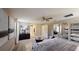Luxurious bedroom featuring neutral decor, mirrors and soft lighting creating an open and bright space at 1919 Blissful Dr, Kissimmee, FL 34744