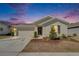 Charming single-story home with a well-maintained lawn and a welcoming front entrance, creating a cozy curb appeal at 272 Pershing St, Bartow, FL 33830