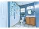 Cozy bathroom with updated vanity, shower, and neutral paint at 3518 Remington Oaks Way, Lakeland, FL 33810