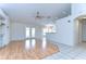 Inviting living room showcases wood floors, recessed lighting, and an open layout at 3518 Remington Oaks Way, Lakeland, FL 33810